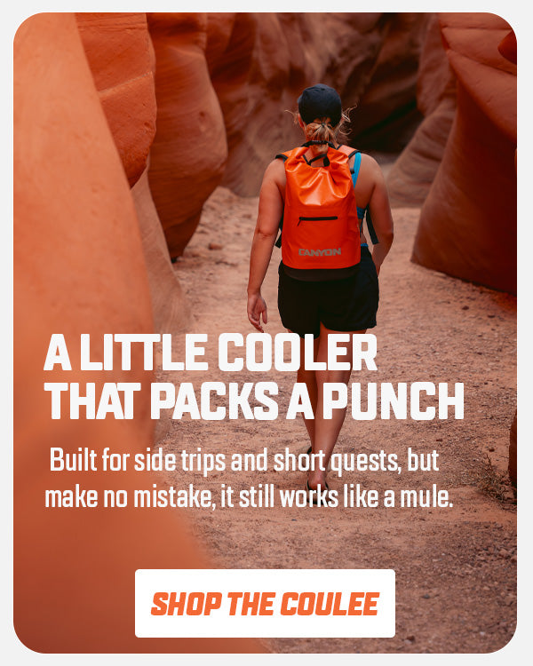 Image of a woman walking through a slot canyon wearing an orange Coulee Backpack Cooler. Text on the image reads, "A little cooler that packs a punch"