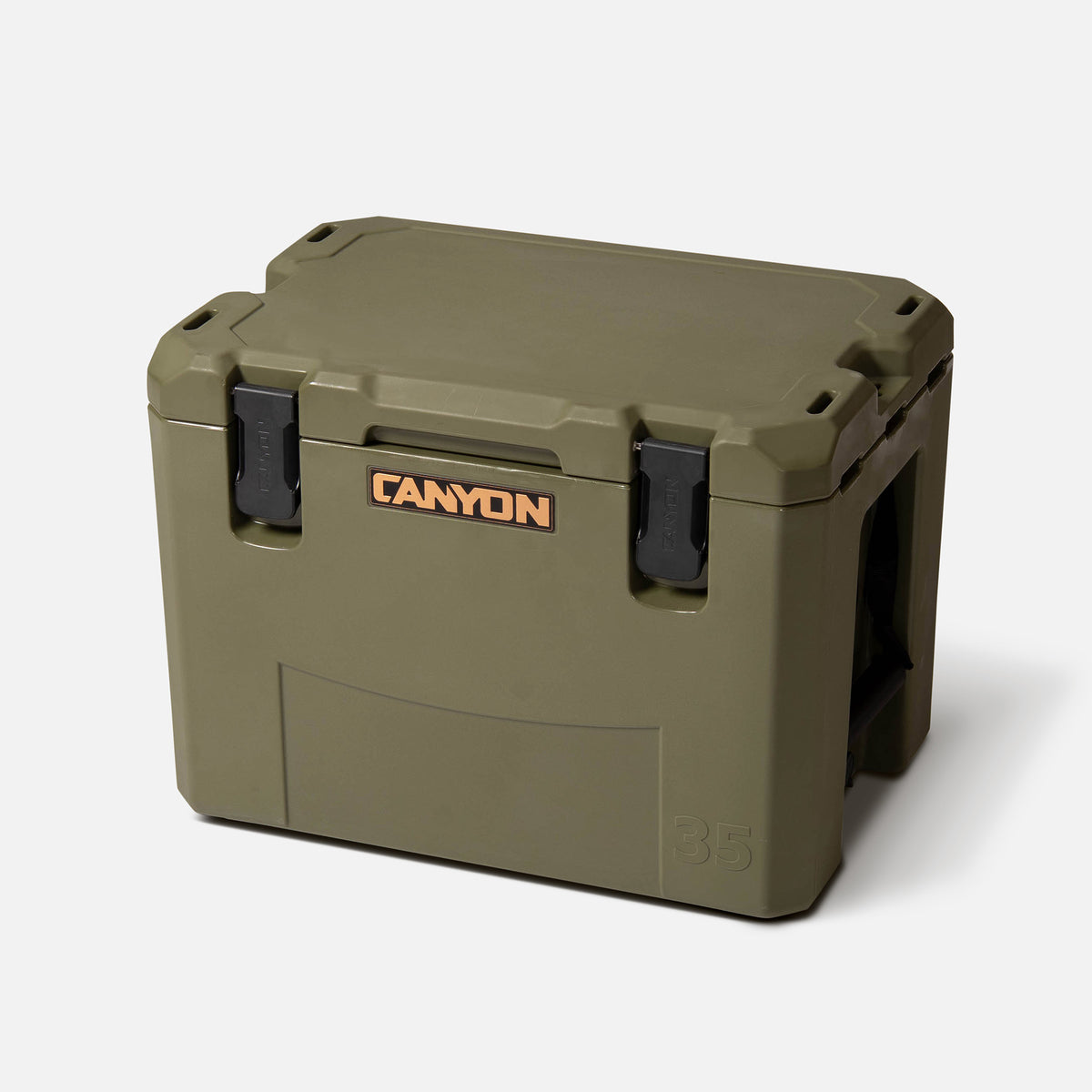 Green 35qt medium rotomolded hard cooler offset lid closed with black latches and the canyon brand logo on the top front. strap handle