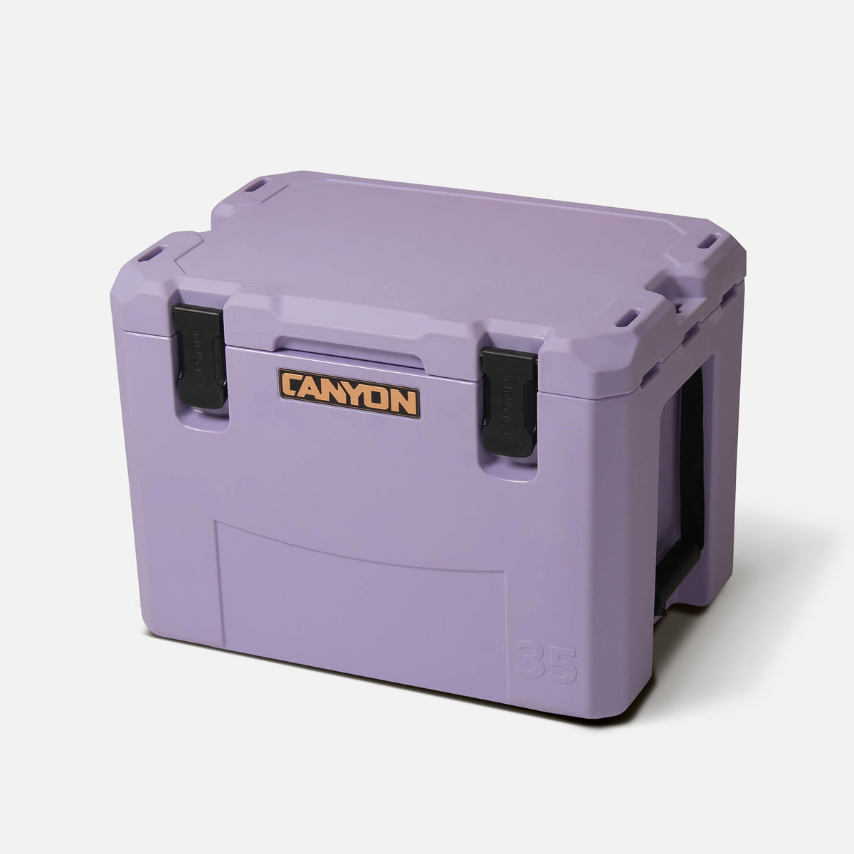 purple 35qt medium rotomolded hard cooler offset lid closed with black latches and the canyon brand logo on the top front. strap handle