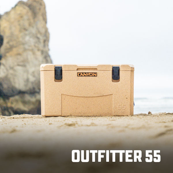 Outfitter 55 V2 Sandstone sitting in the sand